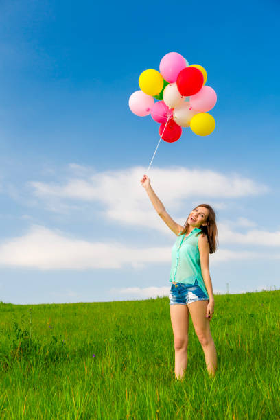 istock Girl with Ballons 647473882