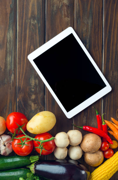 istock Group of vegetables on a wood background. 647476924