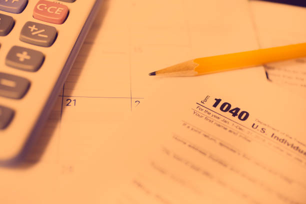 Tax form 1040 U.S. Individual Income Tax Return, business finance concept.