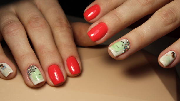 istock Manicure, design of red and white a pattern 647487898