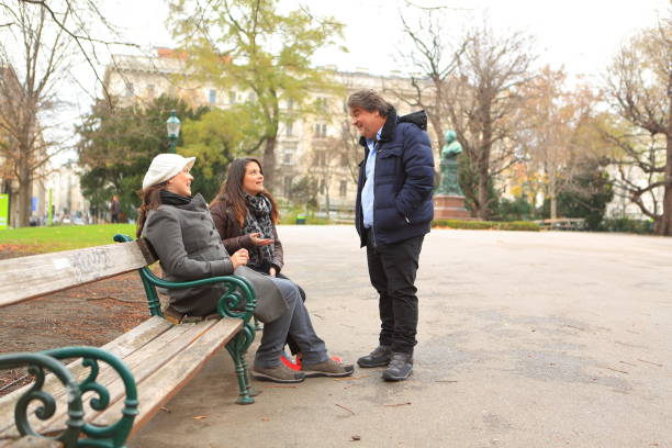 istock Family Talking in the Park 647487954