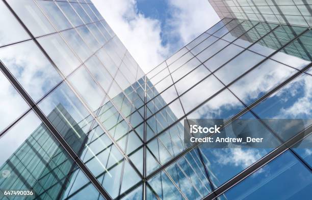 Looking Up A Reflections On Glass Covered Corporate Building Stock Photo - Download Image Now