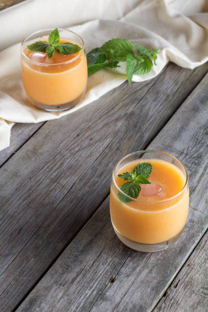 istock two glasses of fruit smoothies 647490476