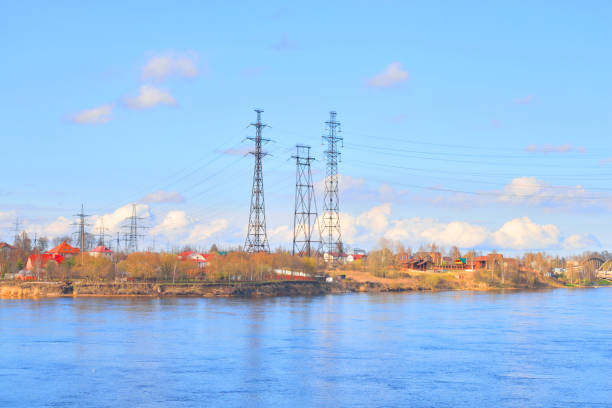 istock Power line and Neva River at early spring. 647491172