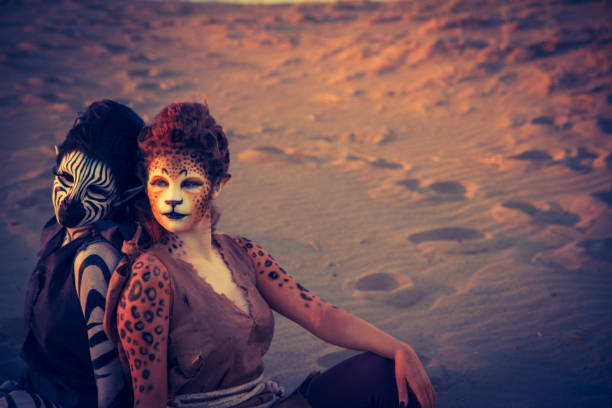 istock Anthropomorphic Lion and Cheetah Actors In The Desert 647494576