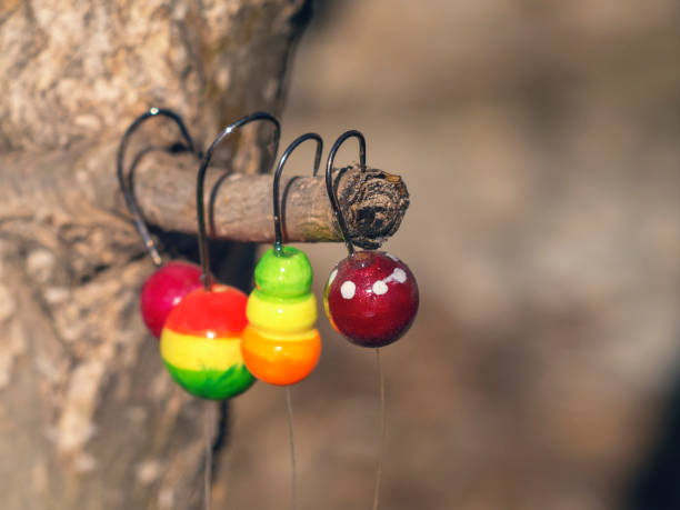 istock colored floats with hooks for fishing 647523648