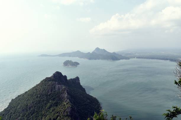 istock Beautiful blue sea and green island 647523702