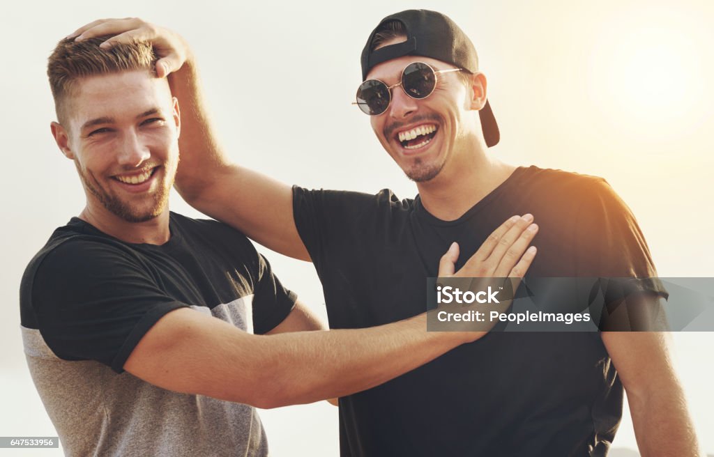 My wingman of choice Portrait of two happy friends enjoying the day outside together Friendship Stock Photo