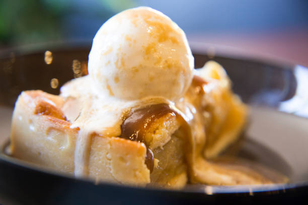 istock Icecream on a piece of apple pie 647534686