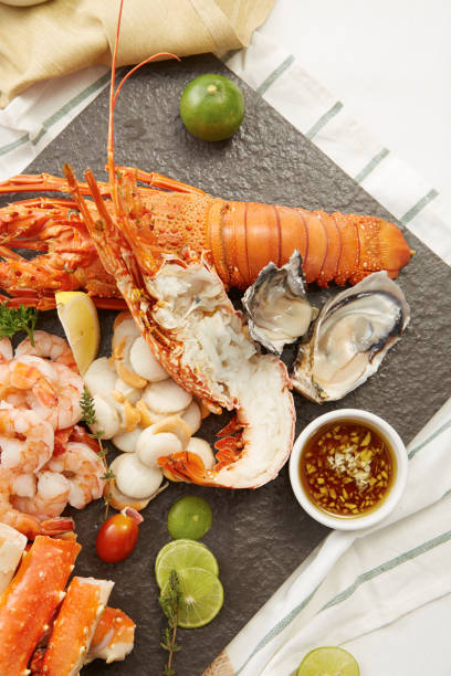 istock boiled prawn and lobster on stone plate 647540234