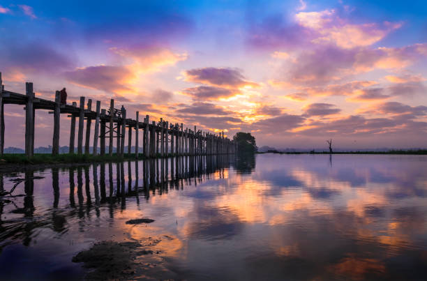istock Colorful Sunrise sky at U Bein bridge 647545512