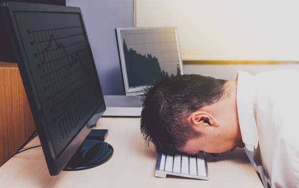 depressed asian businessman stock photo