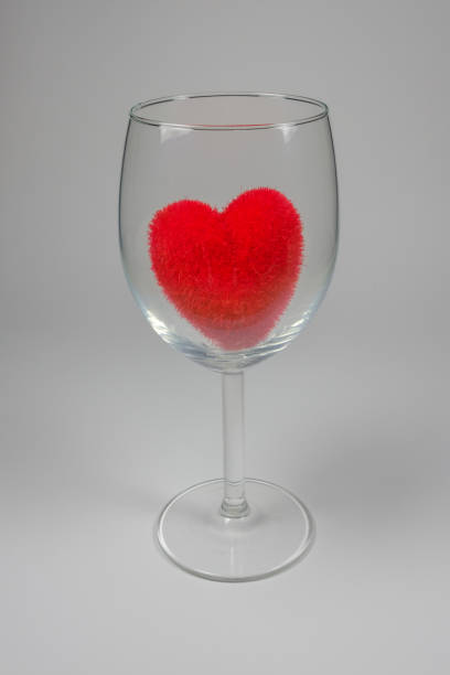 istock Red velvet fluffy heart in Stemware On a white background 647548540