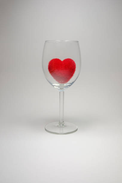 istock Red velvet fluffy heart in Stemware On a white background 647548608