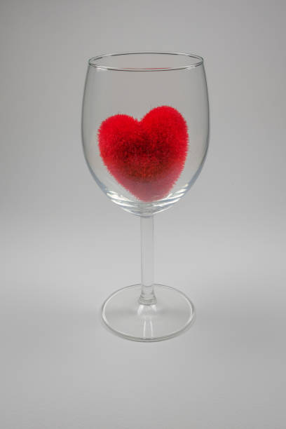 istock Red velvet fluffy heart in Stemware On a white background 647548730