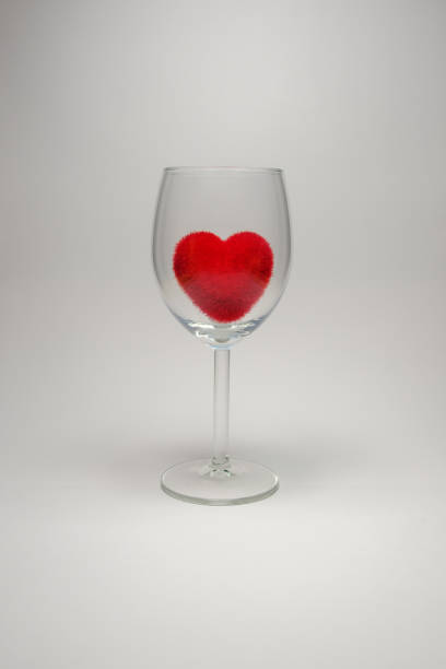 istock Red velvet fluffy heart in Stemware On a white background 647548786