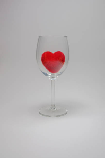 istock Red velvet fluffy heart in Stemware On a white background 647548810