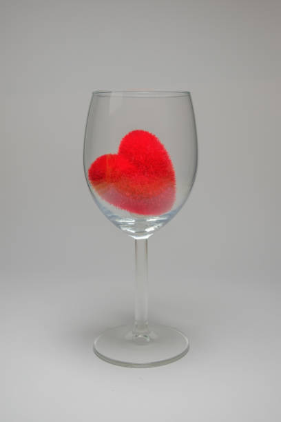 istock Red velvet fluffy heart in Stemware On a white background 647548816