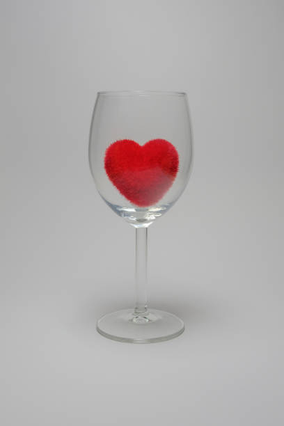 istock Red velvet fluffy heart in Stemware On a white background 647548874