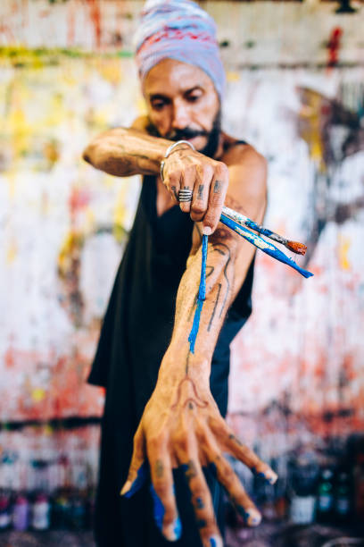 Brazilian artist working at atelier.