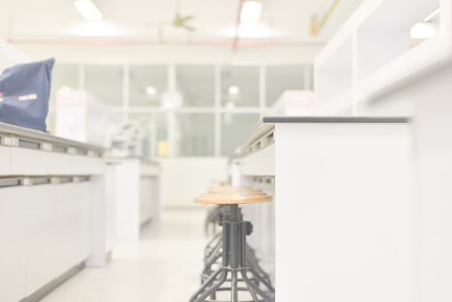 blurred sterio microscope in biology laboratory in white