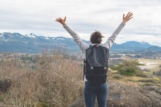 istock Young physically fit woman hiking by herself 647566596