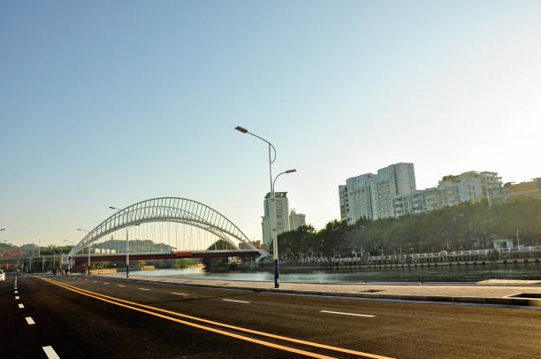 istock Empty asphalt road through the city center at dusk,China. 647567432