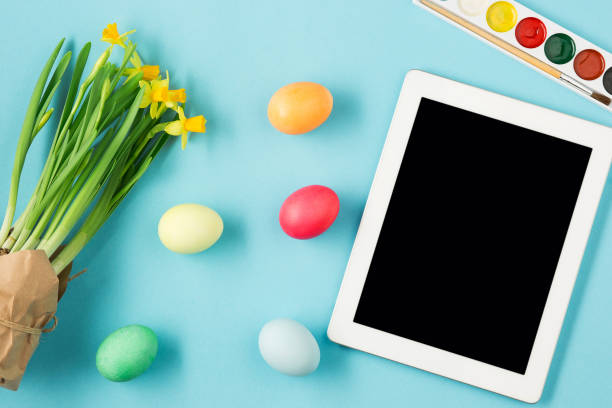 istock The top view of easter on blue table office workplace 647570796