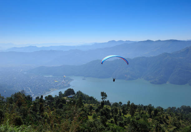 istock View of a paragliding in the air 647573494