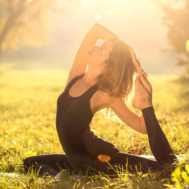 istock Woman doing yoga 647573604