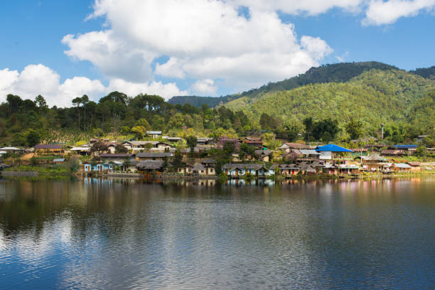 istock Reflection of Thai house with blue sky 647577270
