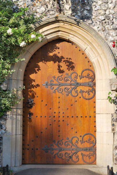 istock old oak church door closed 647583758