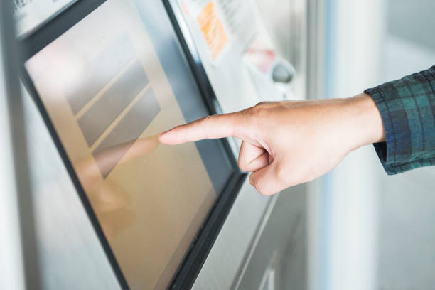 istock Man touching the screen, buy transport tickets 647584054