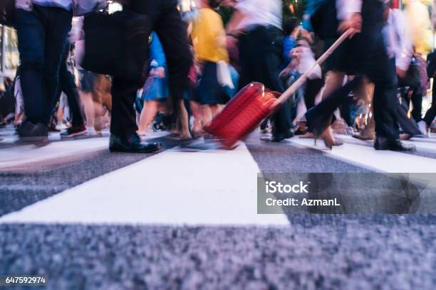 Tokyo Commuters On Shibuya Crossing In Tokyo Japan Stock Photo - Download Image Now