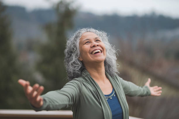 istock Hawaiian woman doing yoga pose outside 647596754