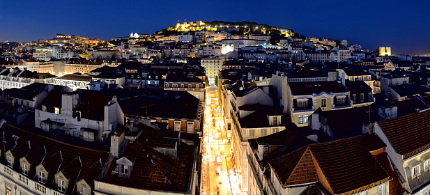 Night panorama of Lisbon Old Town, Portugal. Composite photo