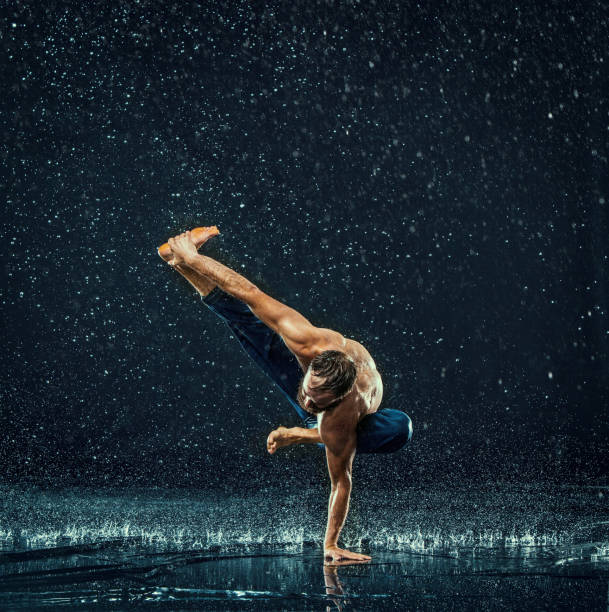 istock The male break dancer in water 647606820