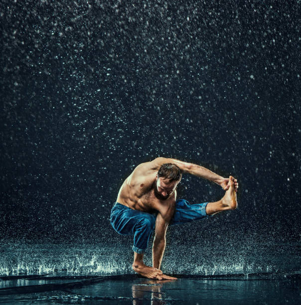 istock The male break dancer in water 647607658