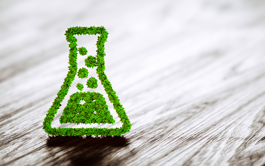 Green chemistry industry sign on black wooden background. 3D rendering.