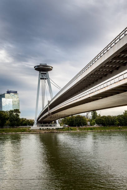 istock Bratislava view with perspective of landmark, bridge over river Danube. 647625856