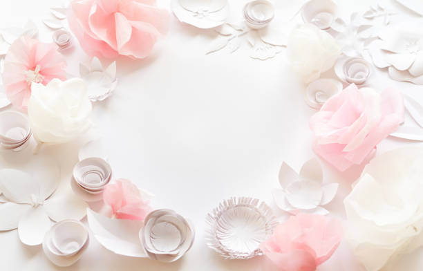 istock white and rose paper flowers 647626304