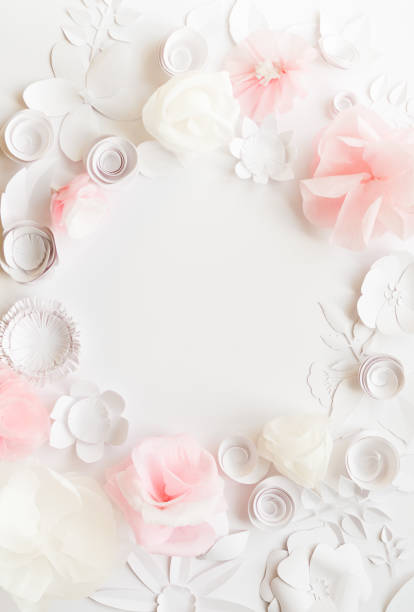 istock white and rose paper flowers 647626340