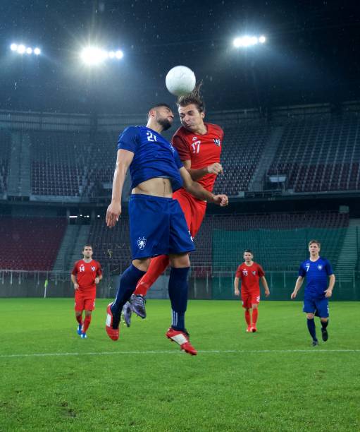 istock Soccer players heading 647630012
