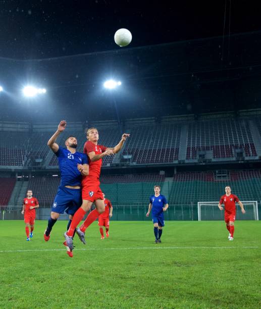 istock Soccer players heading 647630016