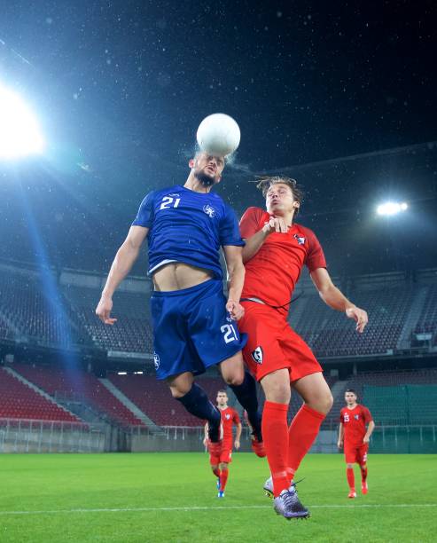 istock Soccer players heading 647630022