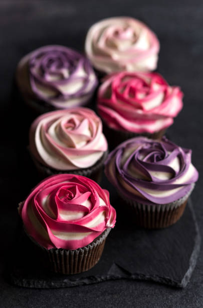 istock Roses on the top of cupcakes 647633930