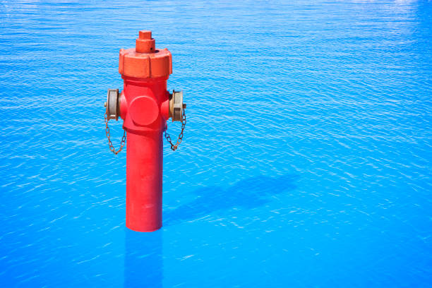 istock An improbable hydrant in the ocean. Plenty of water concept image 647636586