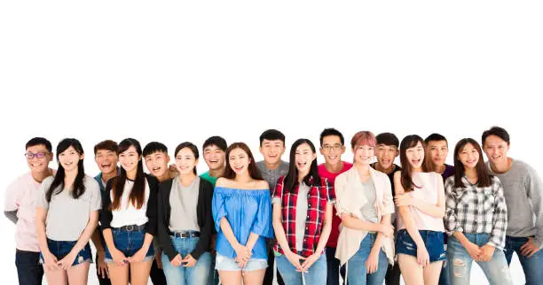 Photo of happy young student group  standing together