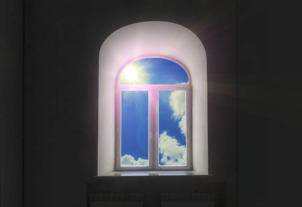 istock sky with clouds and sun in the white semicircular modernist window on black wall 647645058