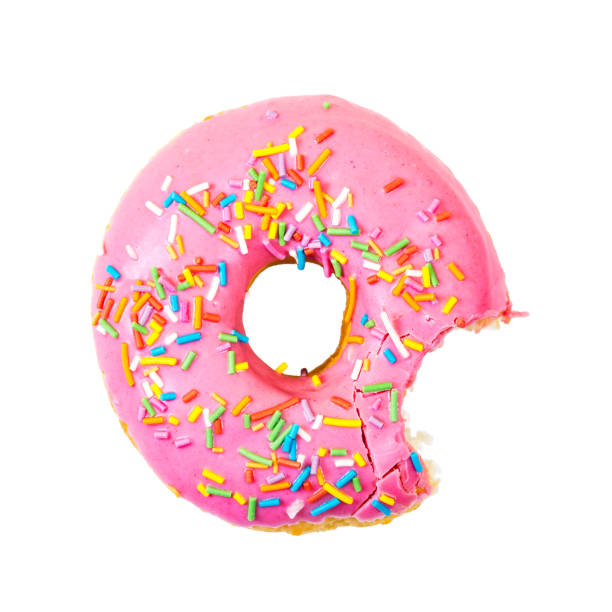 bitten strawberry donut with colorful sprinkles. top view. - heart shape snack dessert symbol imagens e fotografias de stock